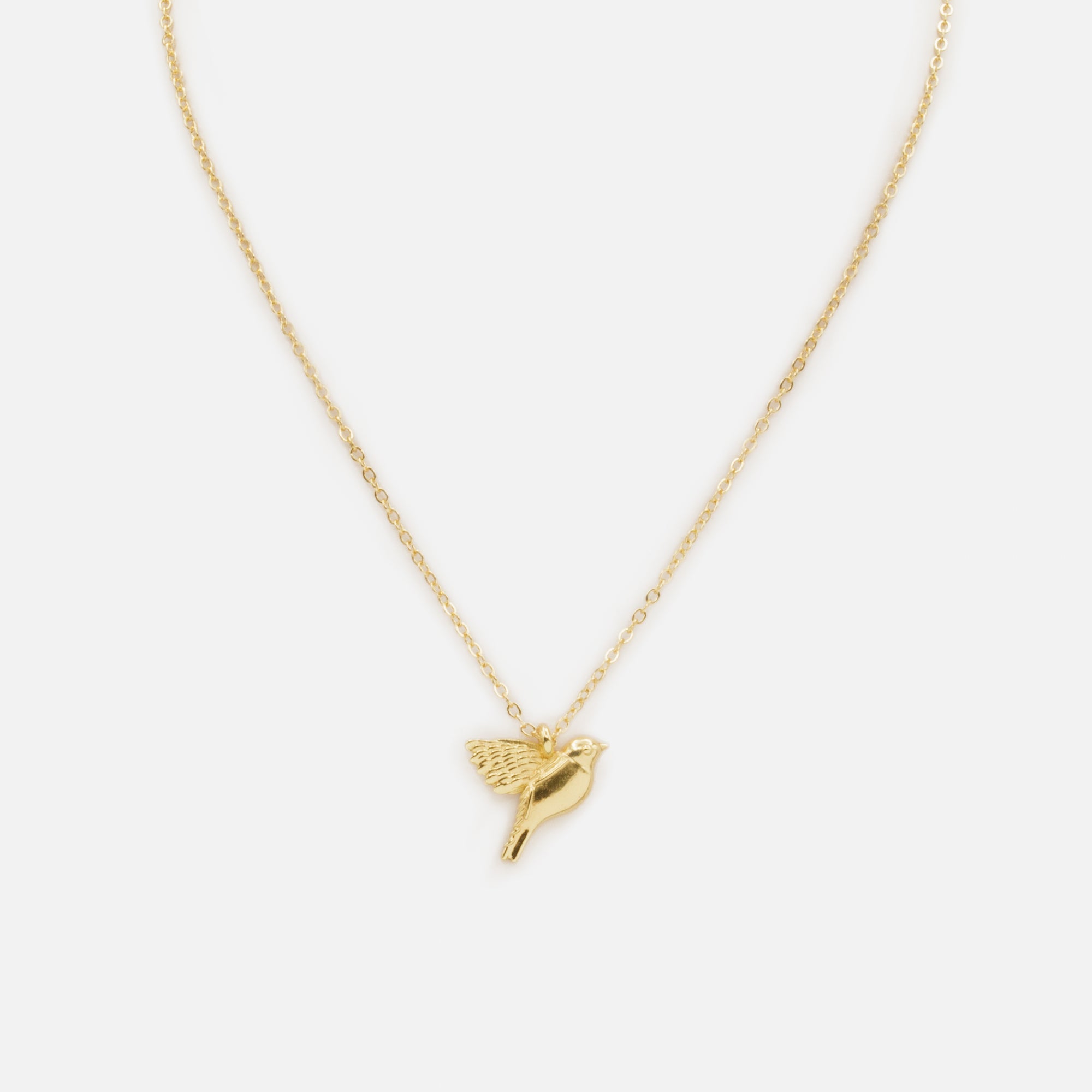 Collier doré avec breloque oiseau