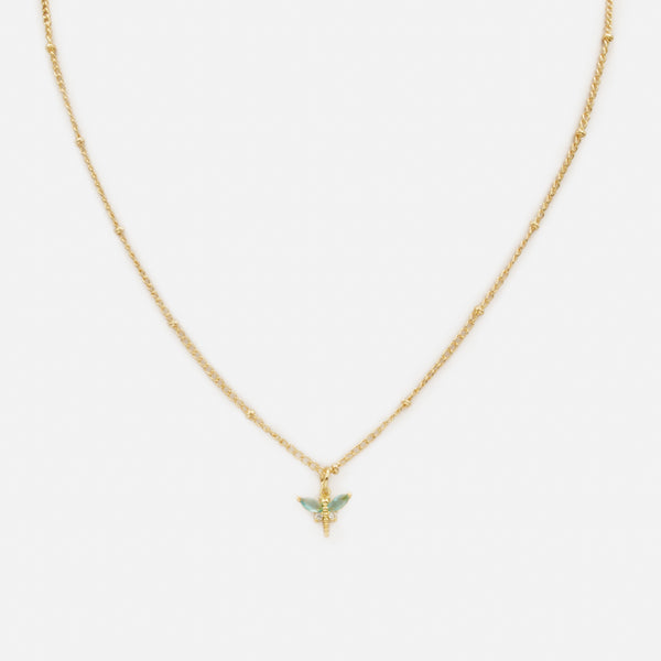 Load image into Gallery viewer, Gold necklace with turquoise winged dragonfly charm
