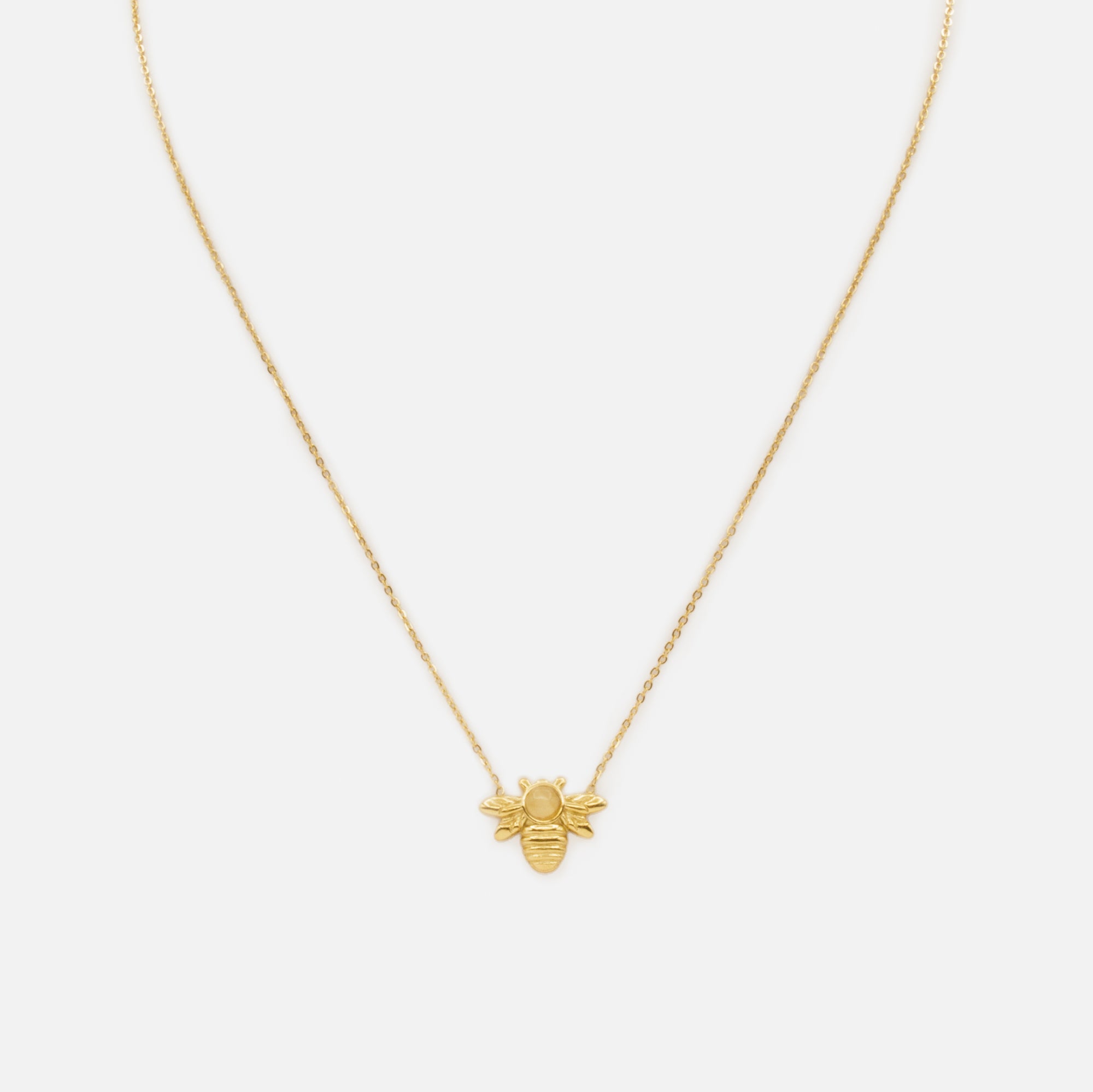 Collier doré avec breloque abeille et pierre translucide