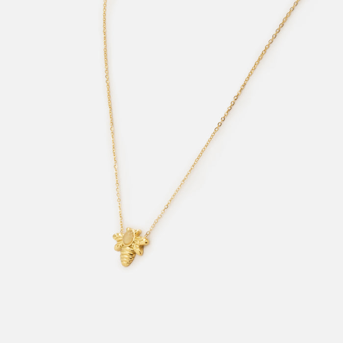 Collier doré avec breloque abeille et pierre translucide