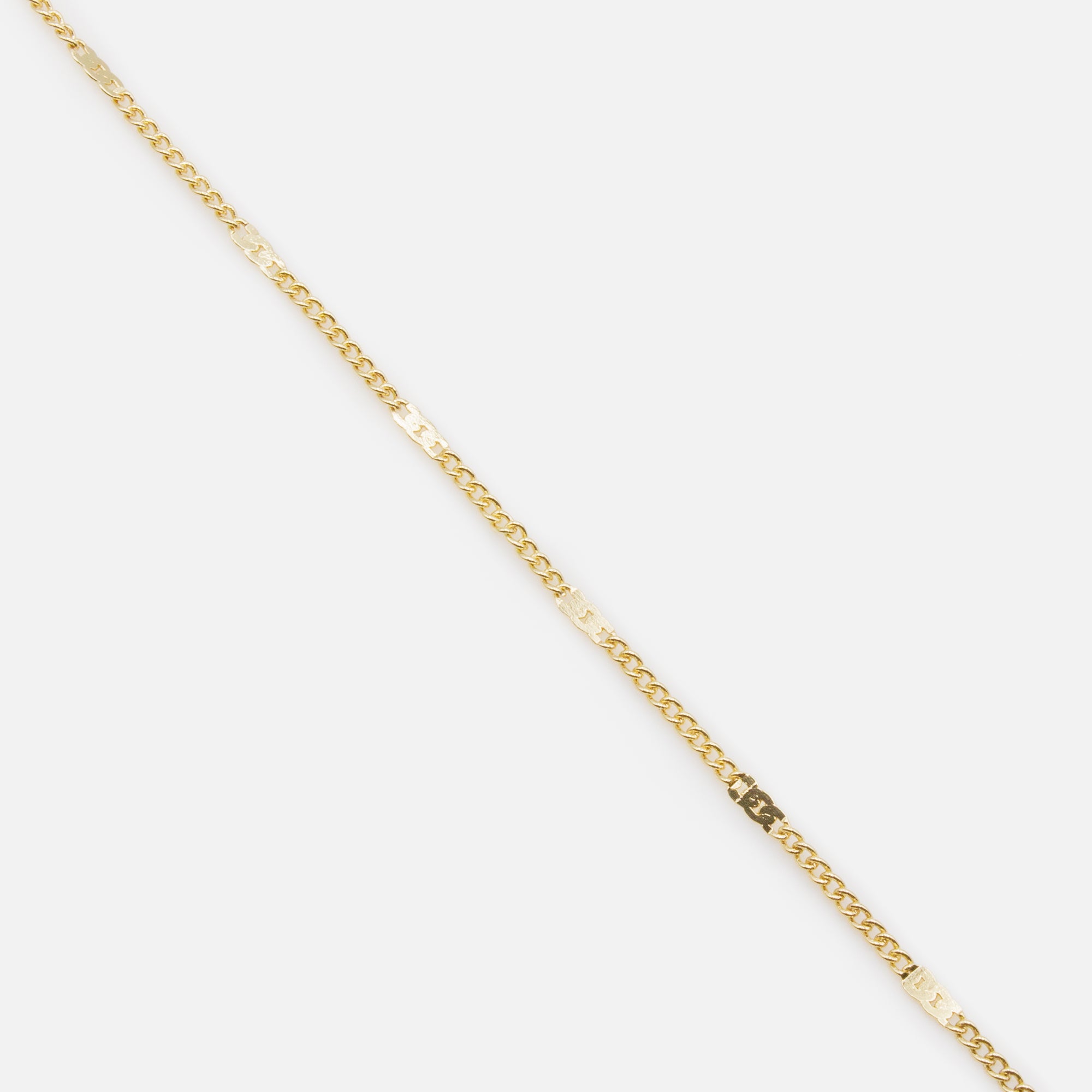 Collier doré double chaîne avec trio de coeurs