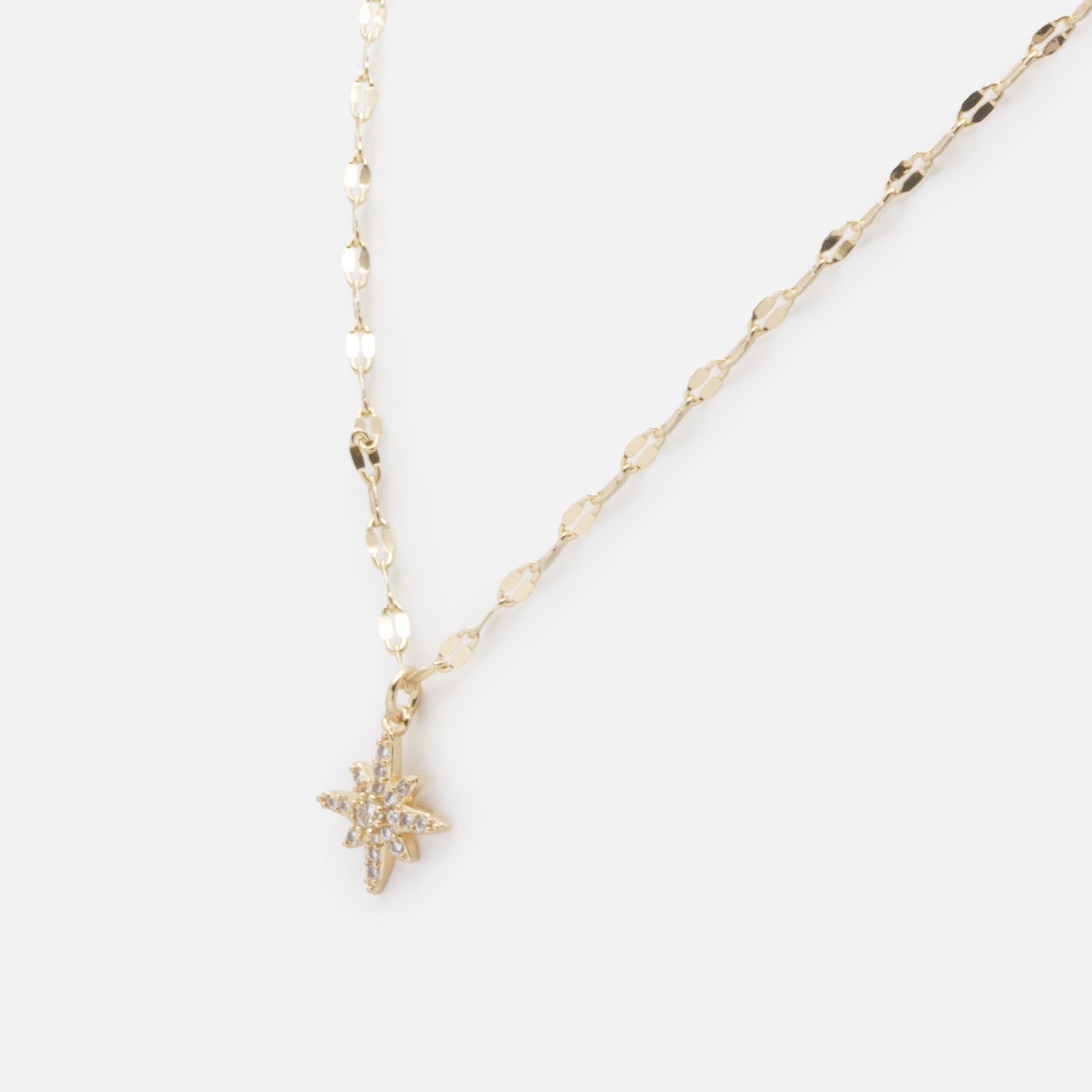 Gold necklace with star charm and cubic zirconia