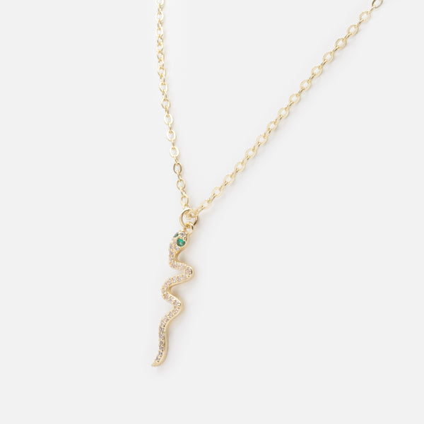 Load image into Gallery viewer, Gold snake charm necklace with cubic zirconia and emerald stones
