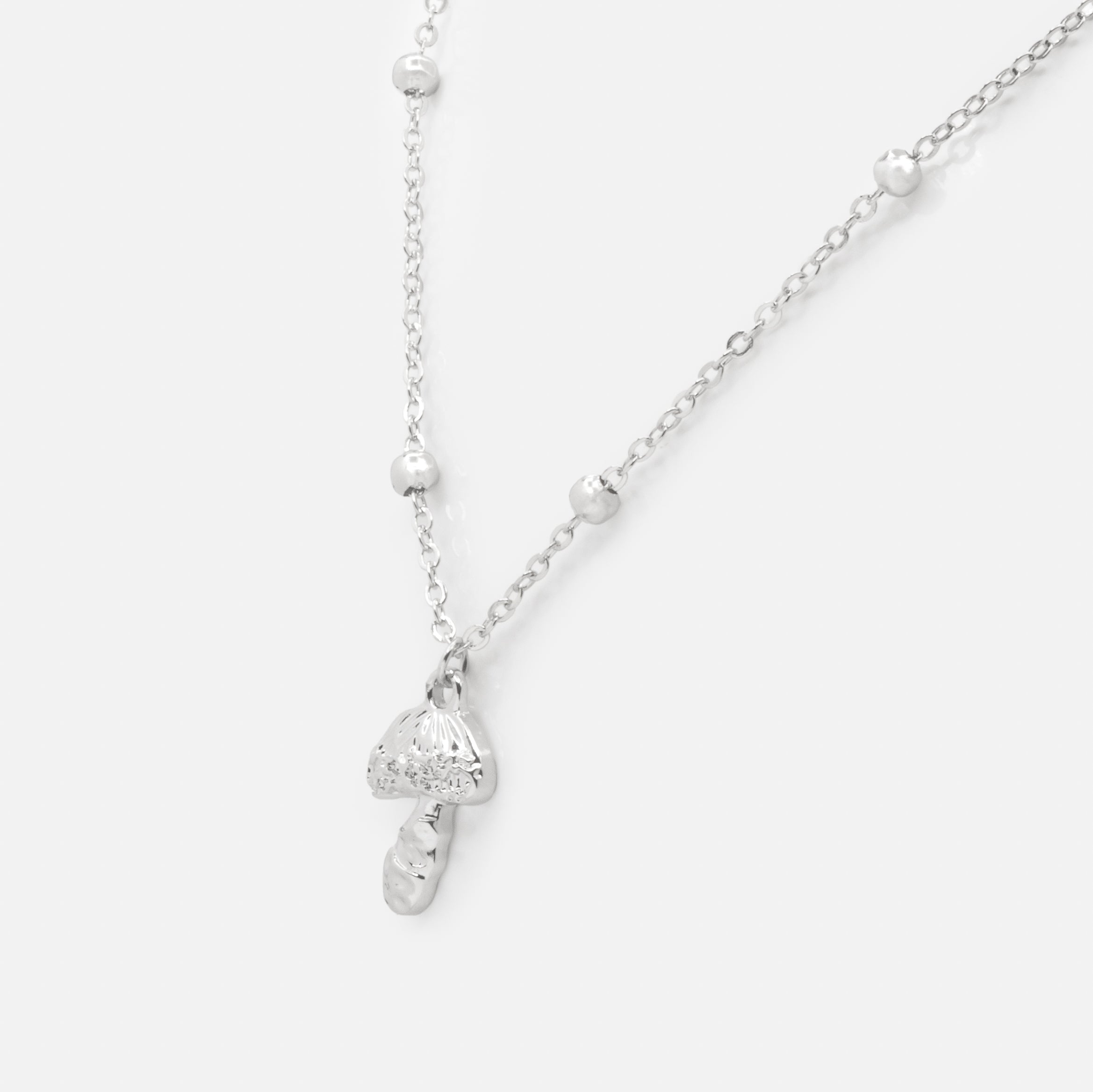 Silver necklace with mushroom charm