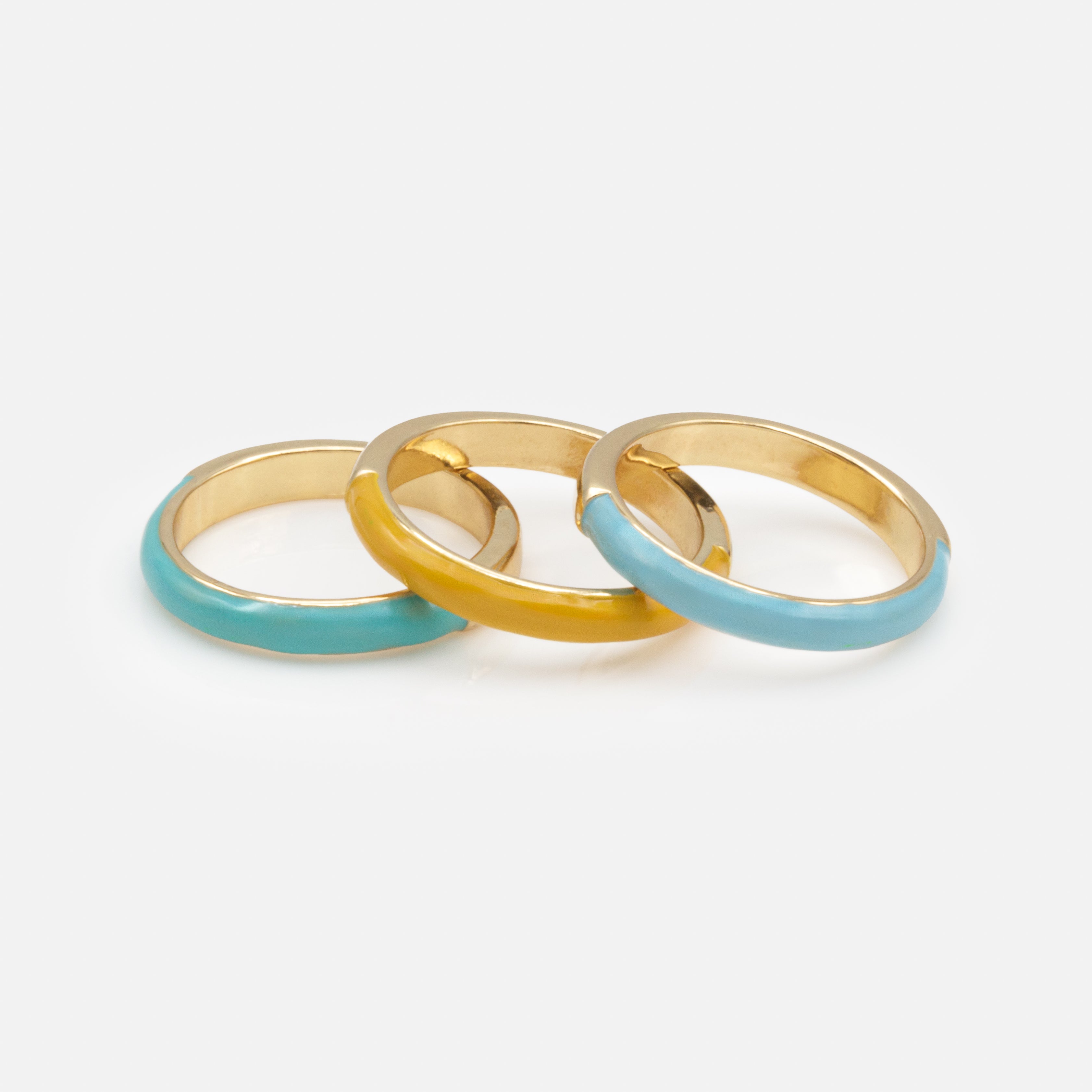 Trio de bagues dorées avec bande colorée