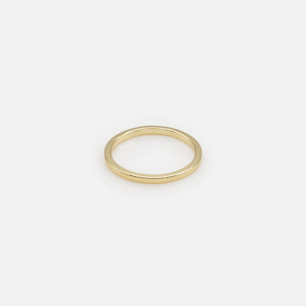 Load image into Gallery viewer, Set of four gold rings in various sizes with texture and cubic zirconia
