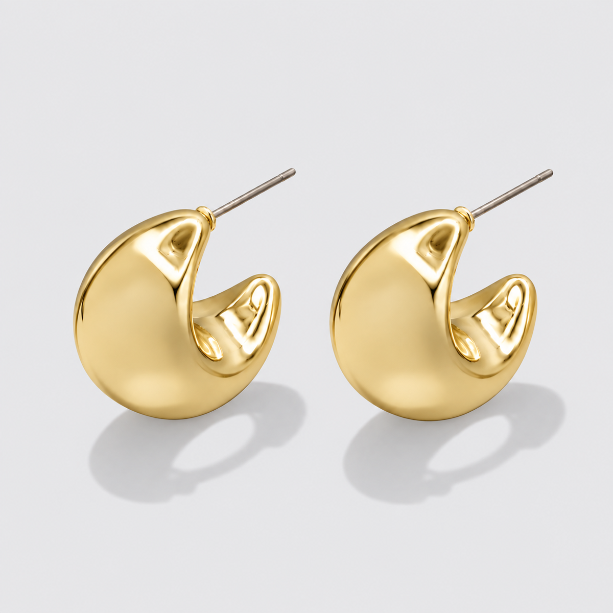 Large gold crescent moon earrings