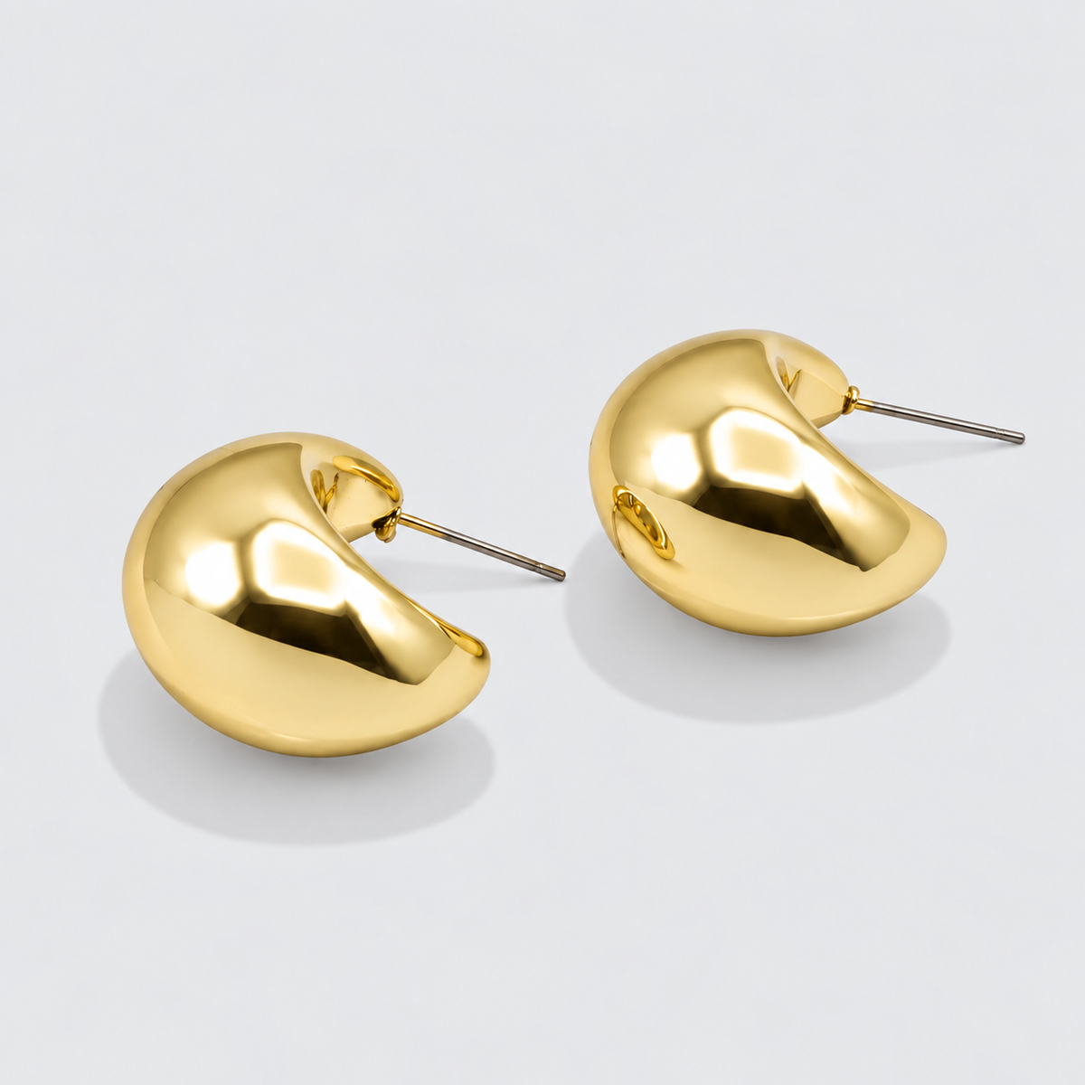 Large gold crescent moon earrings
