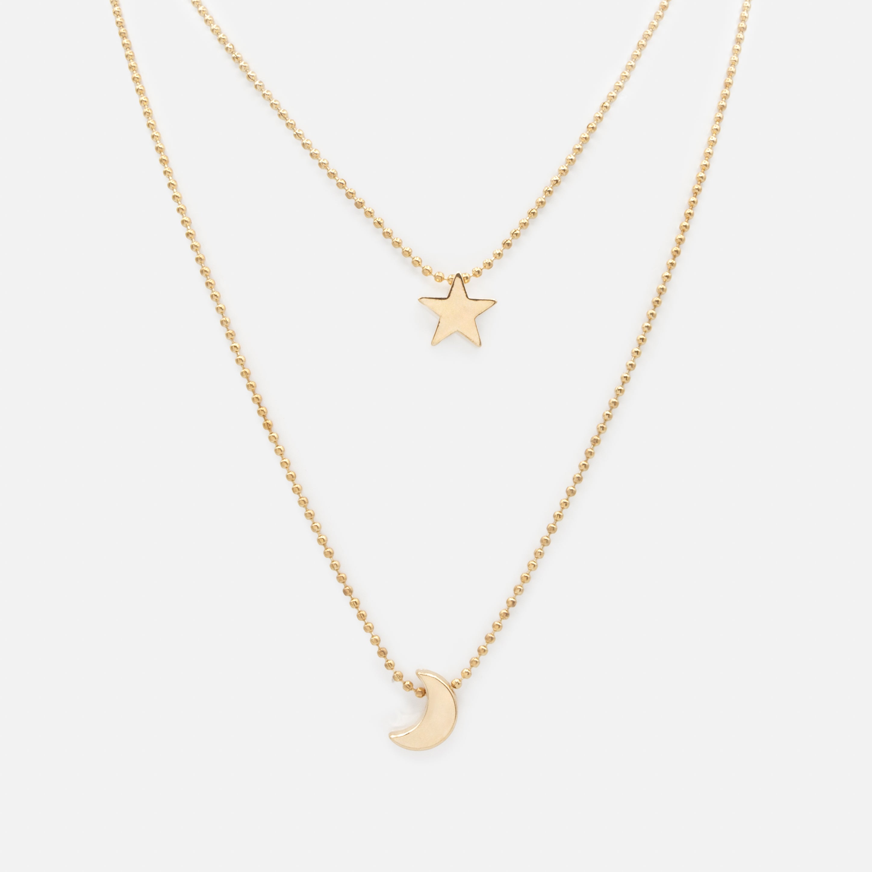 Gold double chain moon and star necklace