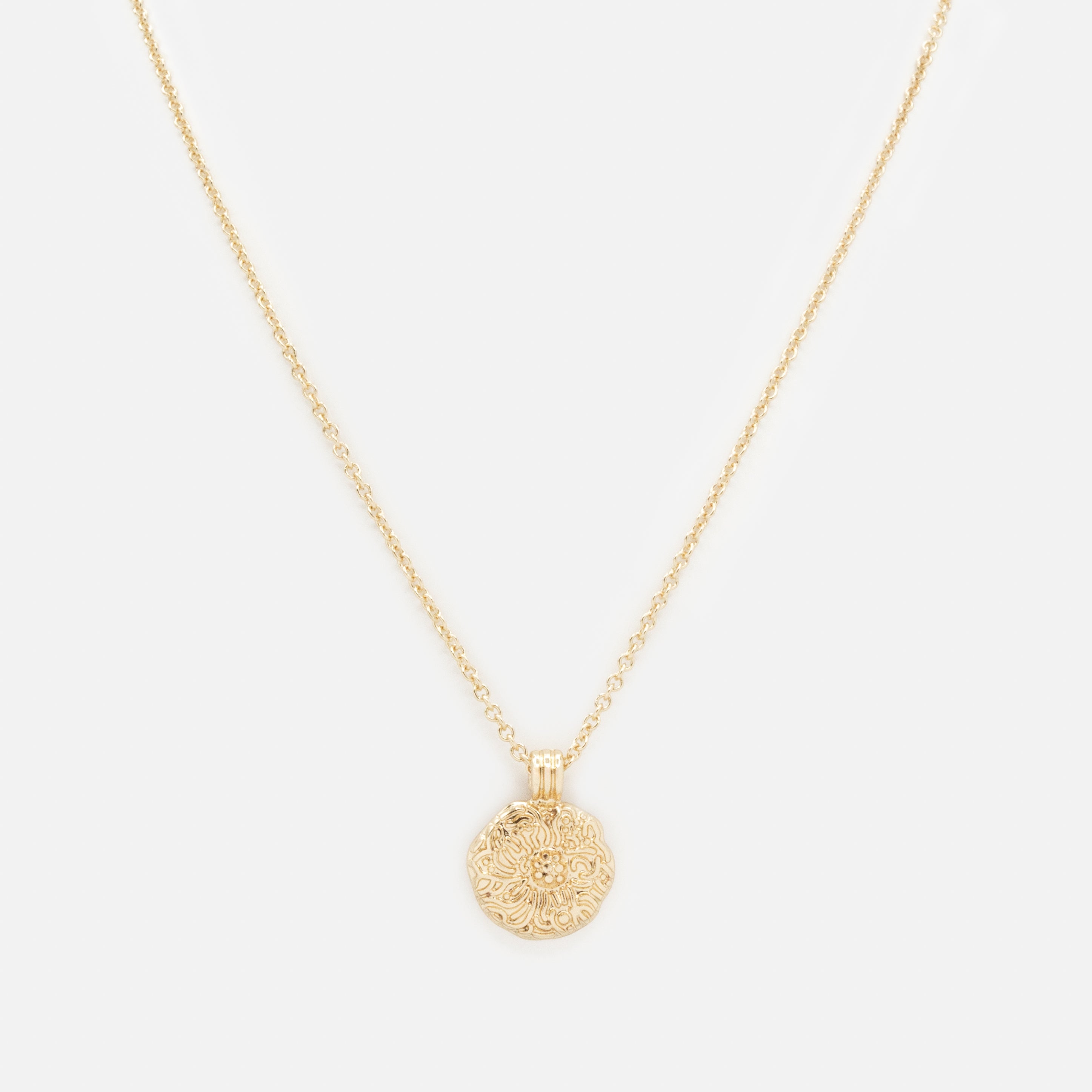 Collier doré breloque fleur texturée