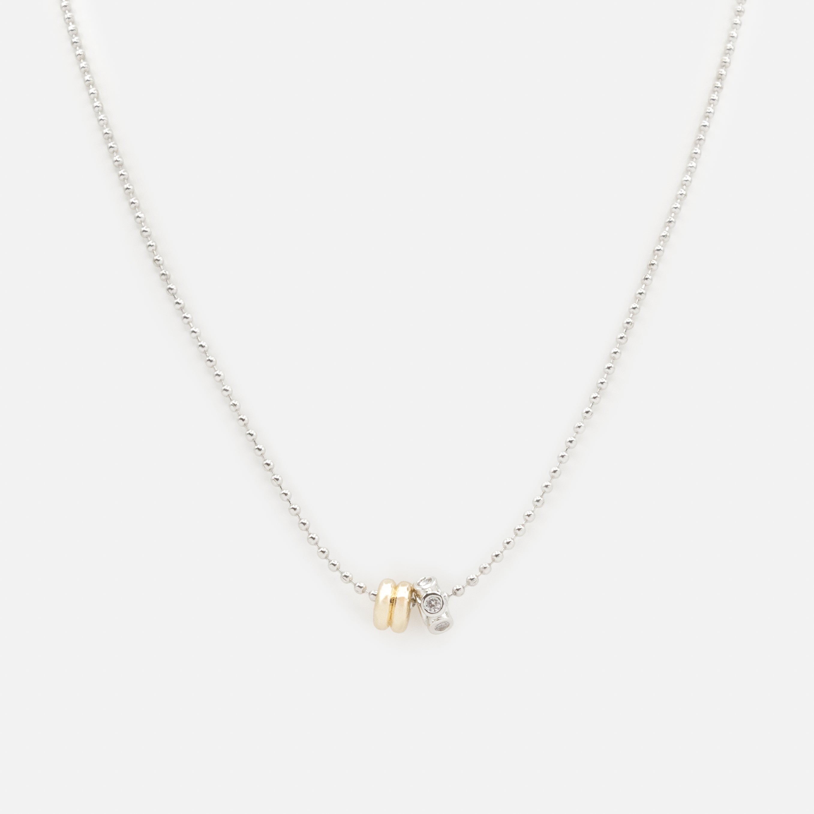 Collier argenté breloques cylindriques deux tons