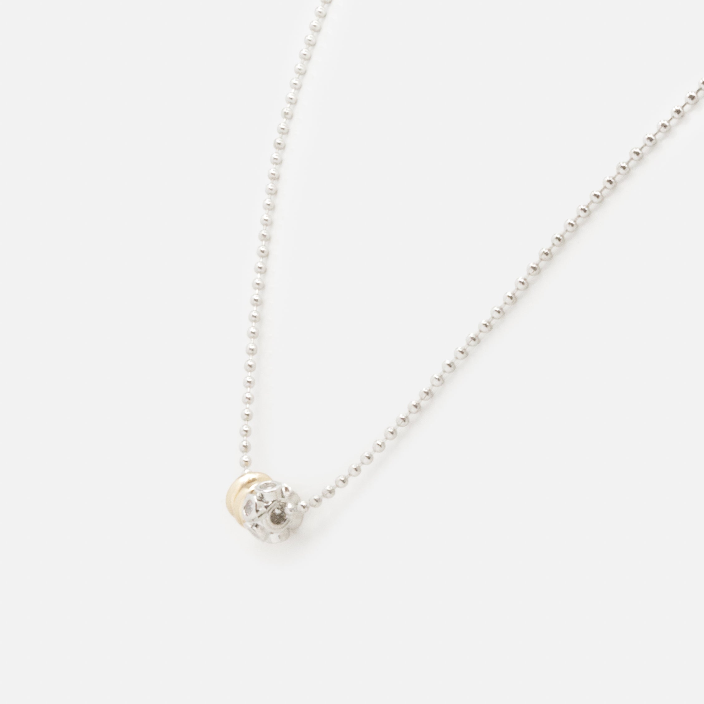Collier argenté breloques cylindriques deux tons