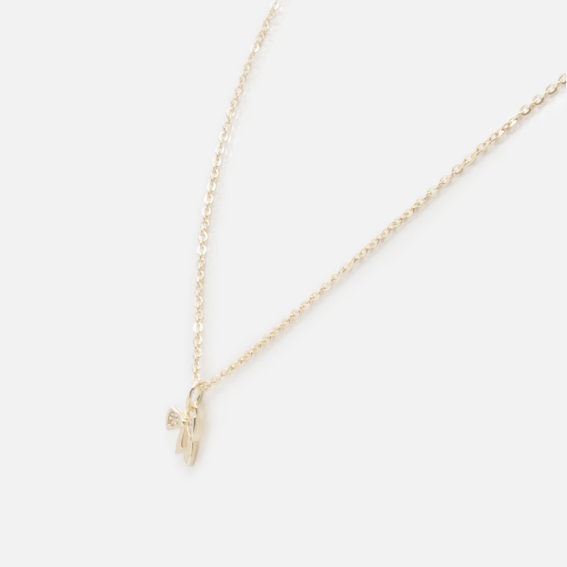 Collier doré breloque petite boucle avec zircons cubiques