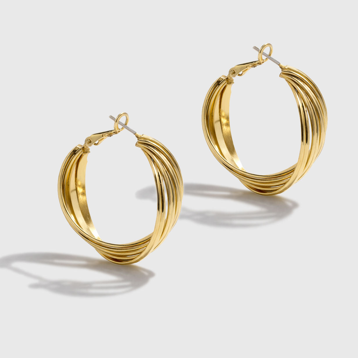 Boucles d'oreilles anneaux torsadés doré