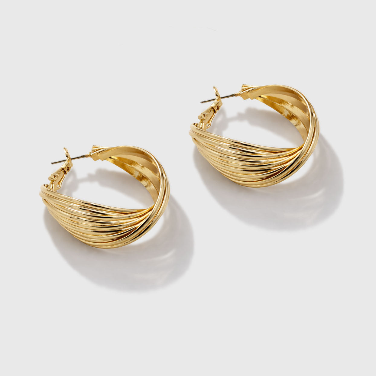 Boucles d'oreilles anneaux torsadés doré