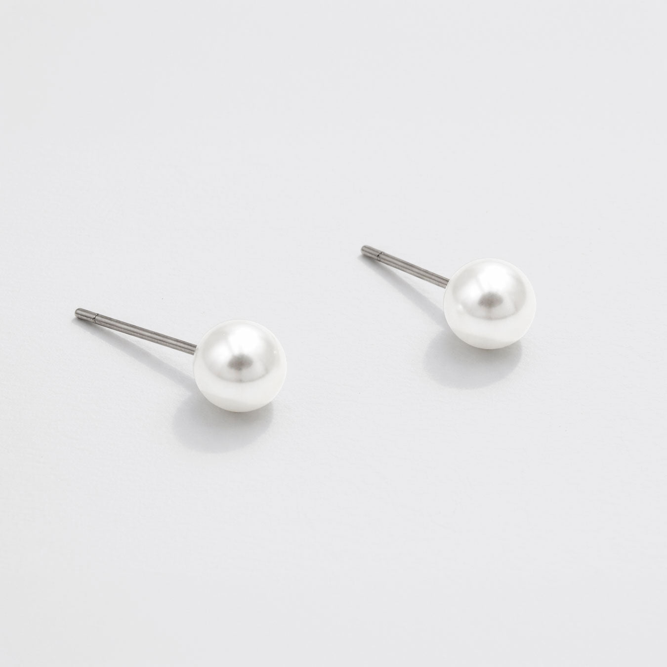 Ensemble de 3 boucles d'oreilles tons dorés avec puces perle, poisson et coquillage