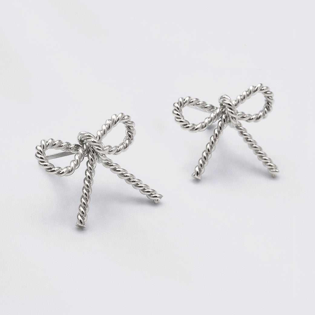 Boucles d'oreilles clous nœud texturé argenté