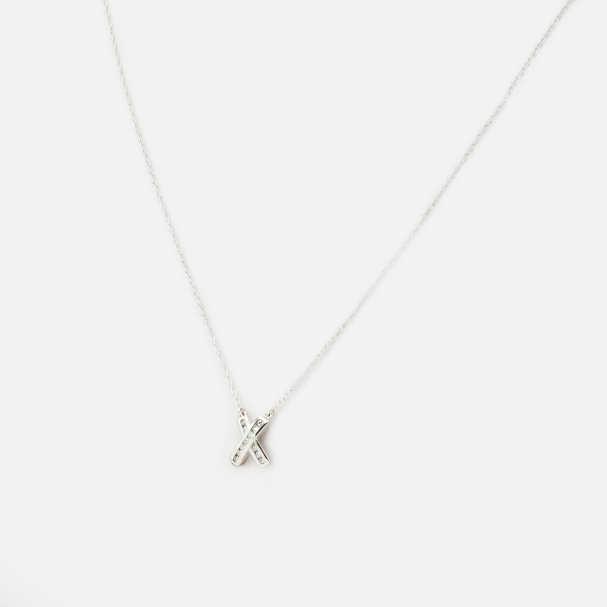 Sterling silver chain with X in zirconia