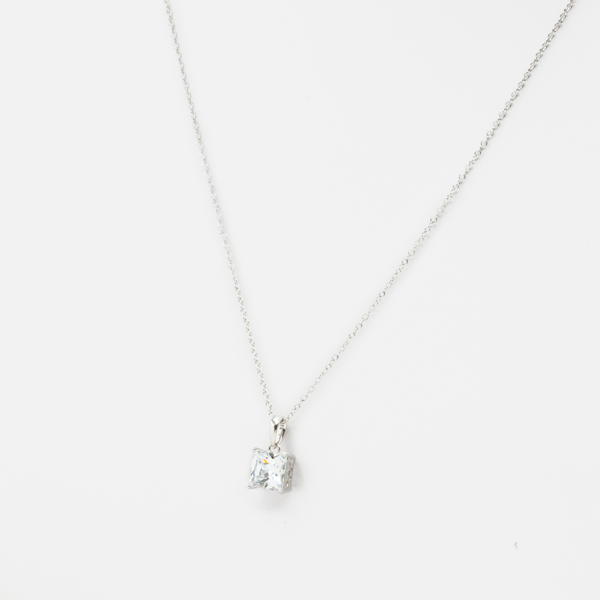 Thin sterling silver chain with zircon charm