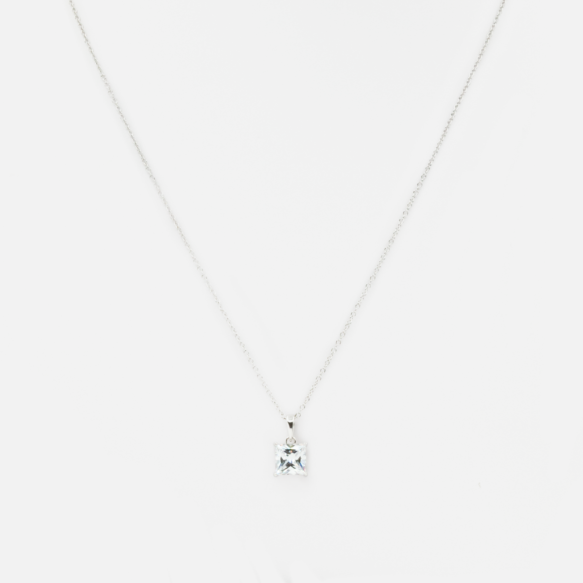 Thin sterling silver chain with zircon charm