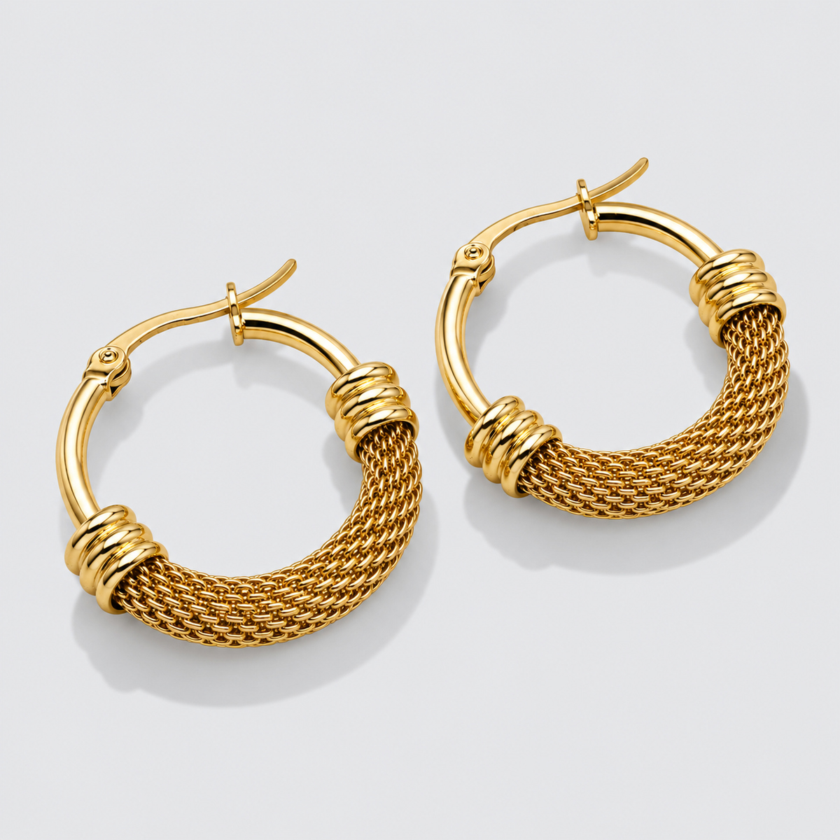 Half-textured gold hoop earrings
