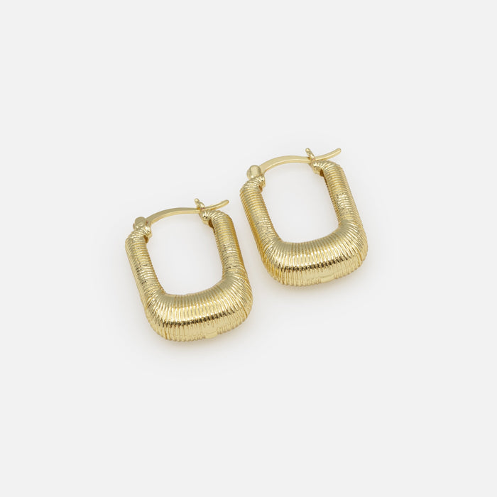 Oval grooved gold earrings