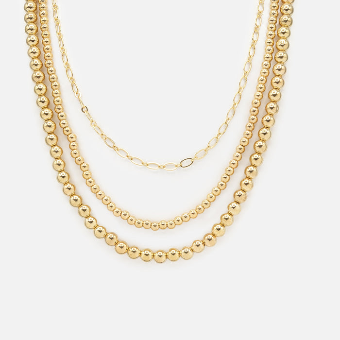 Triple chain gold necklace