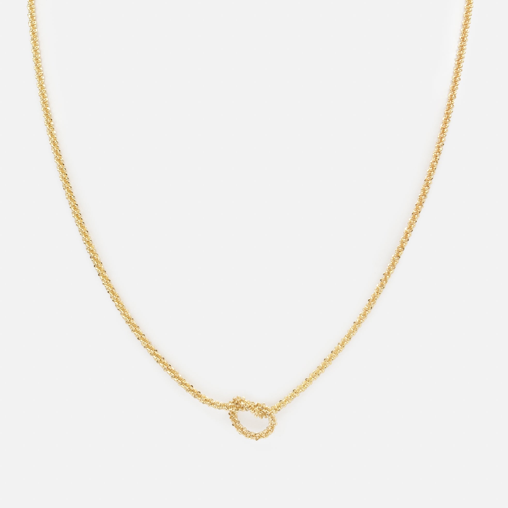 Small golden knot necklace