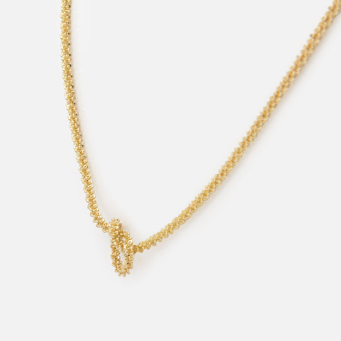 Small golden knot necklace