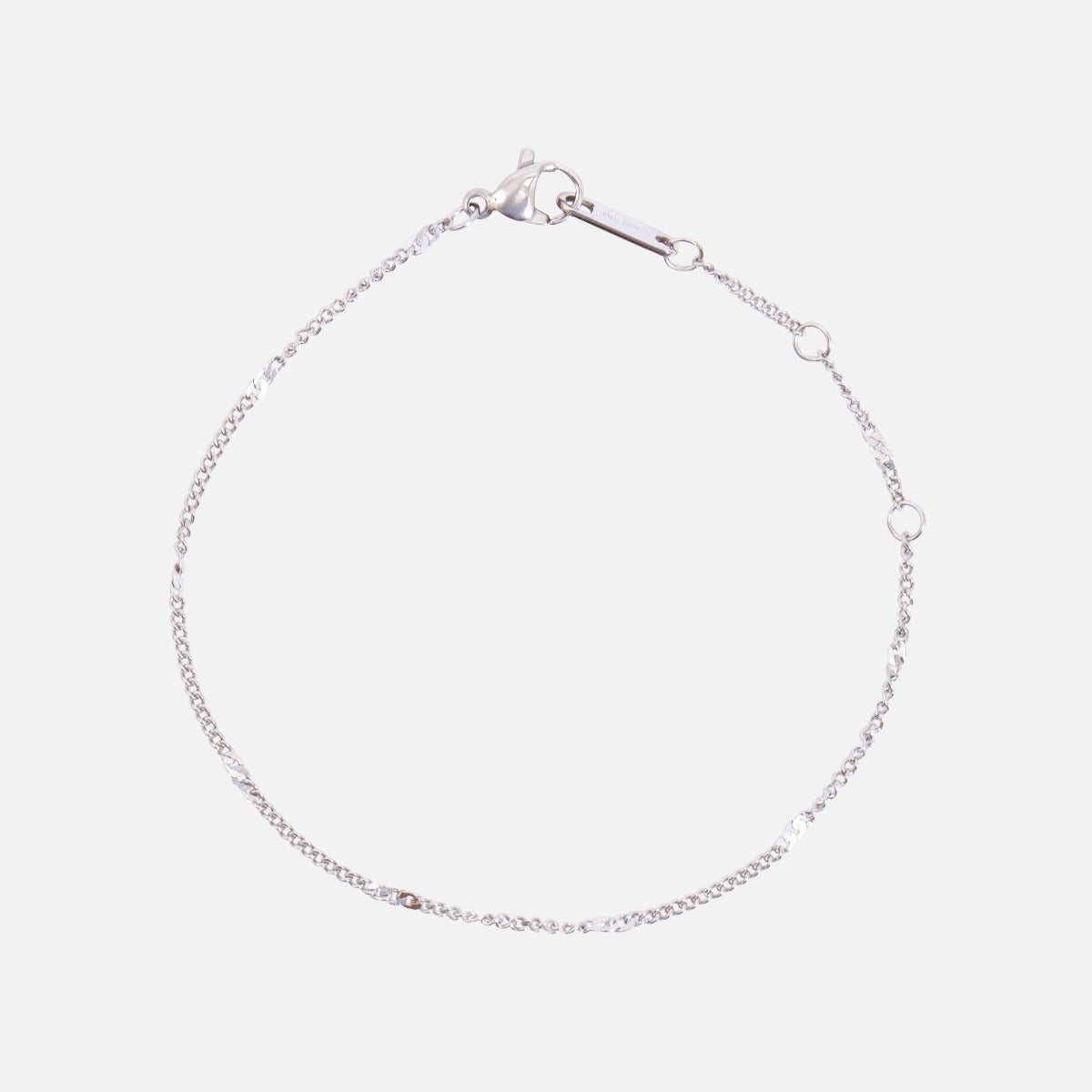 Silver bracelet with flat stainless steel inserts