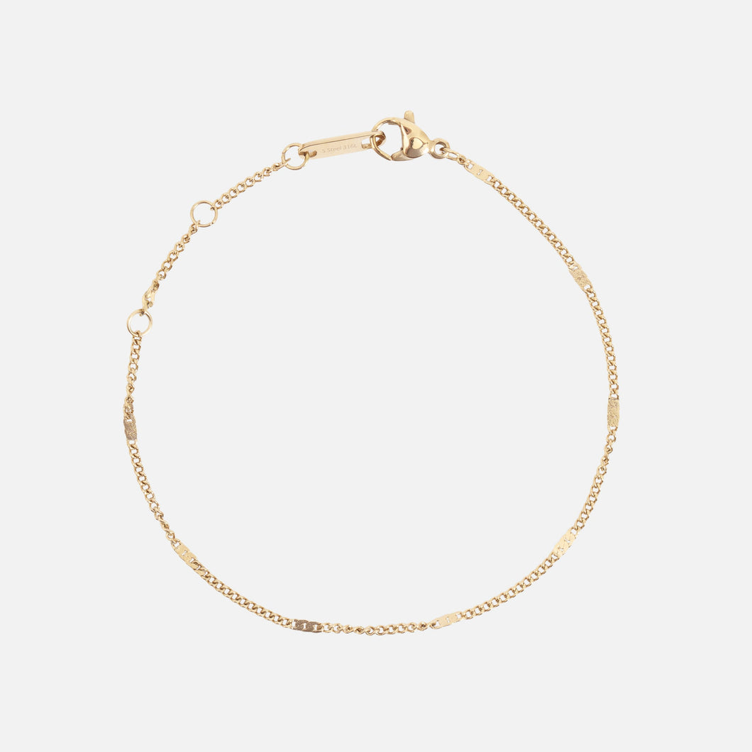 Bracelet doré insertions plates en acier inoxydable