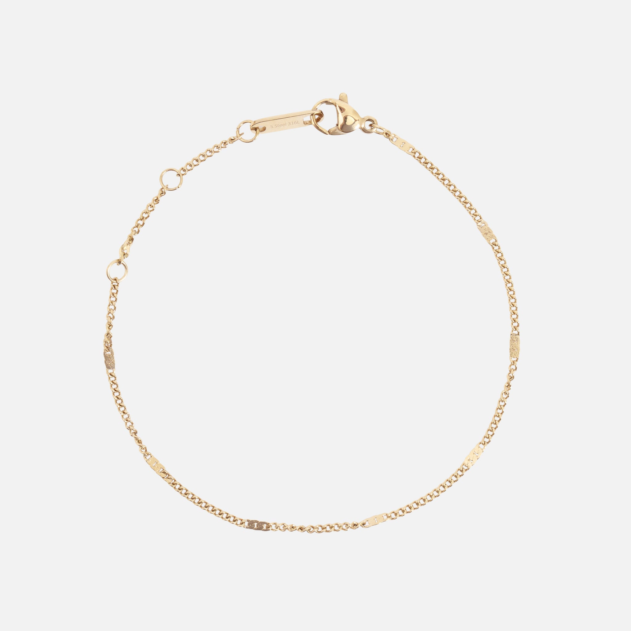 Gold bracelet with flat stainless steel inserts