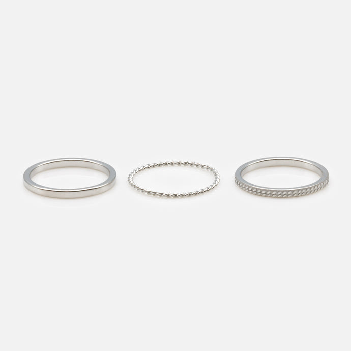 Set of three silver and assorted stainless steel midi rings