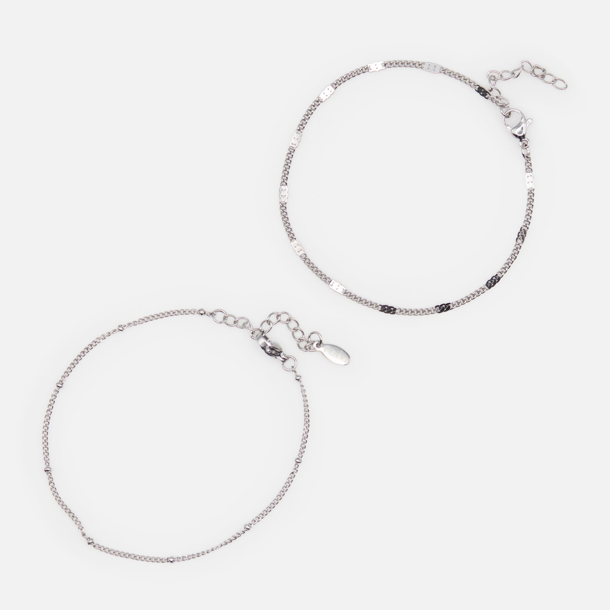 Duo of silver bracelets with beads and flat stainless steel inserts