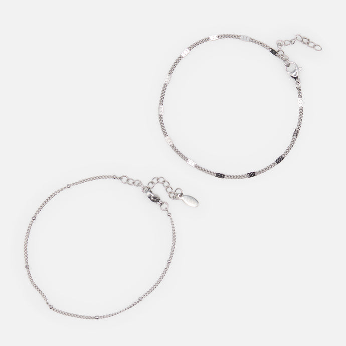 Duo of silver bracelets with beads and flat stainless steel inserts