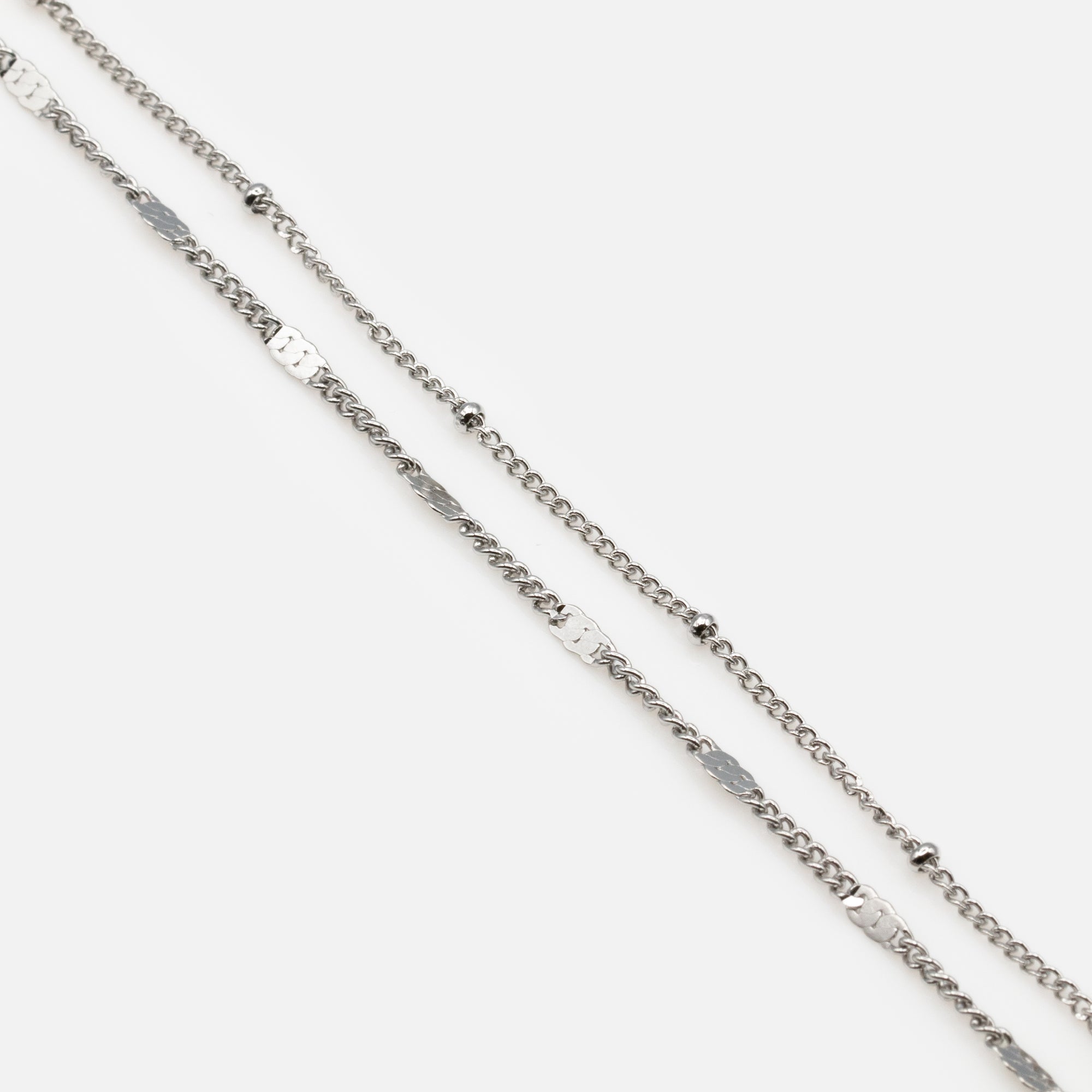 Duo of silver bracelets with beads and flat stainless steel inserts