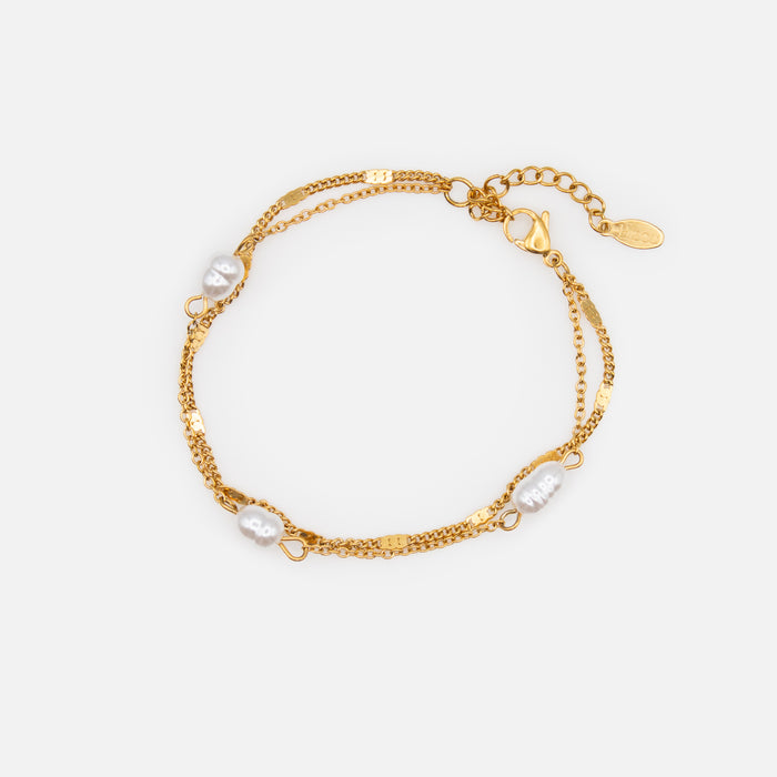 Bracelet doré avec perles et insertions plates en acier inoxydable