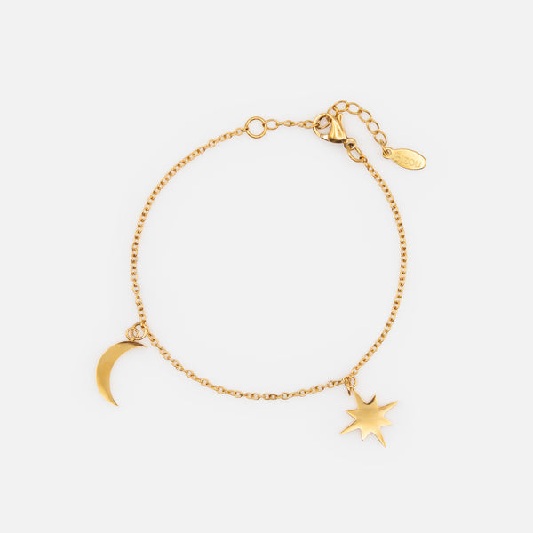 Load image into Gallery viewer, Gold bracelet with moon and star charms in stainless steel
