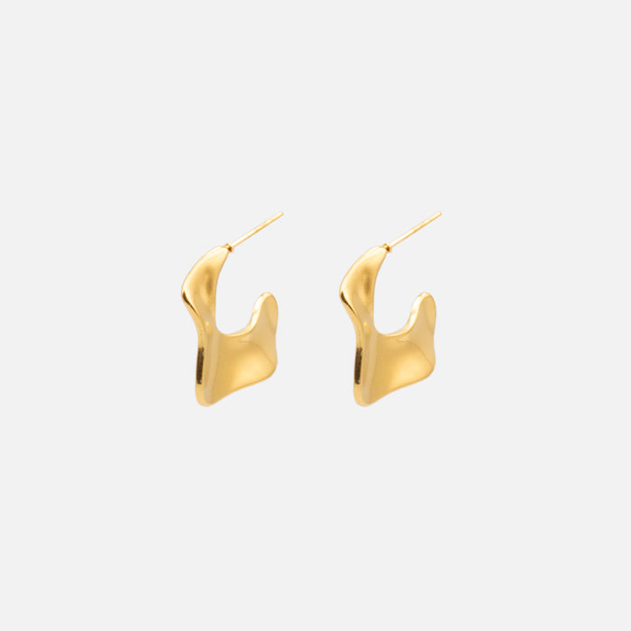 Gold earrings with abstract contours in stainless steel