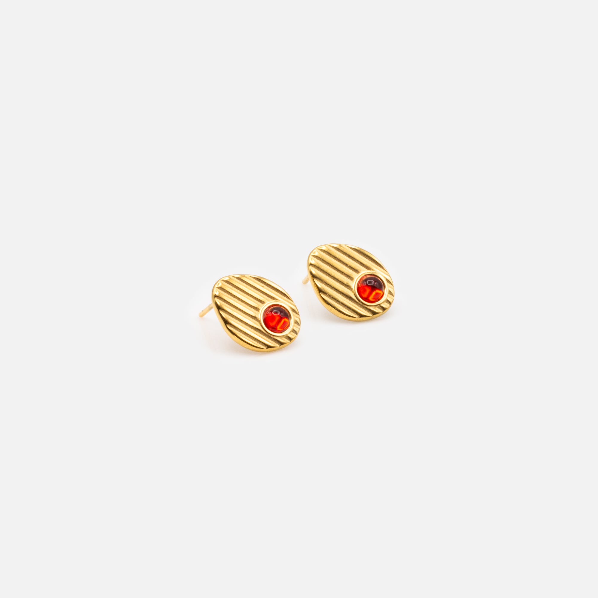 Gold textured earrings with red stone in stainless steel