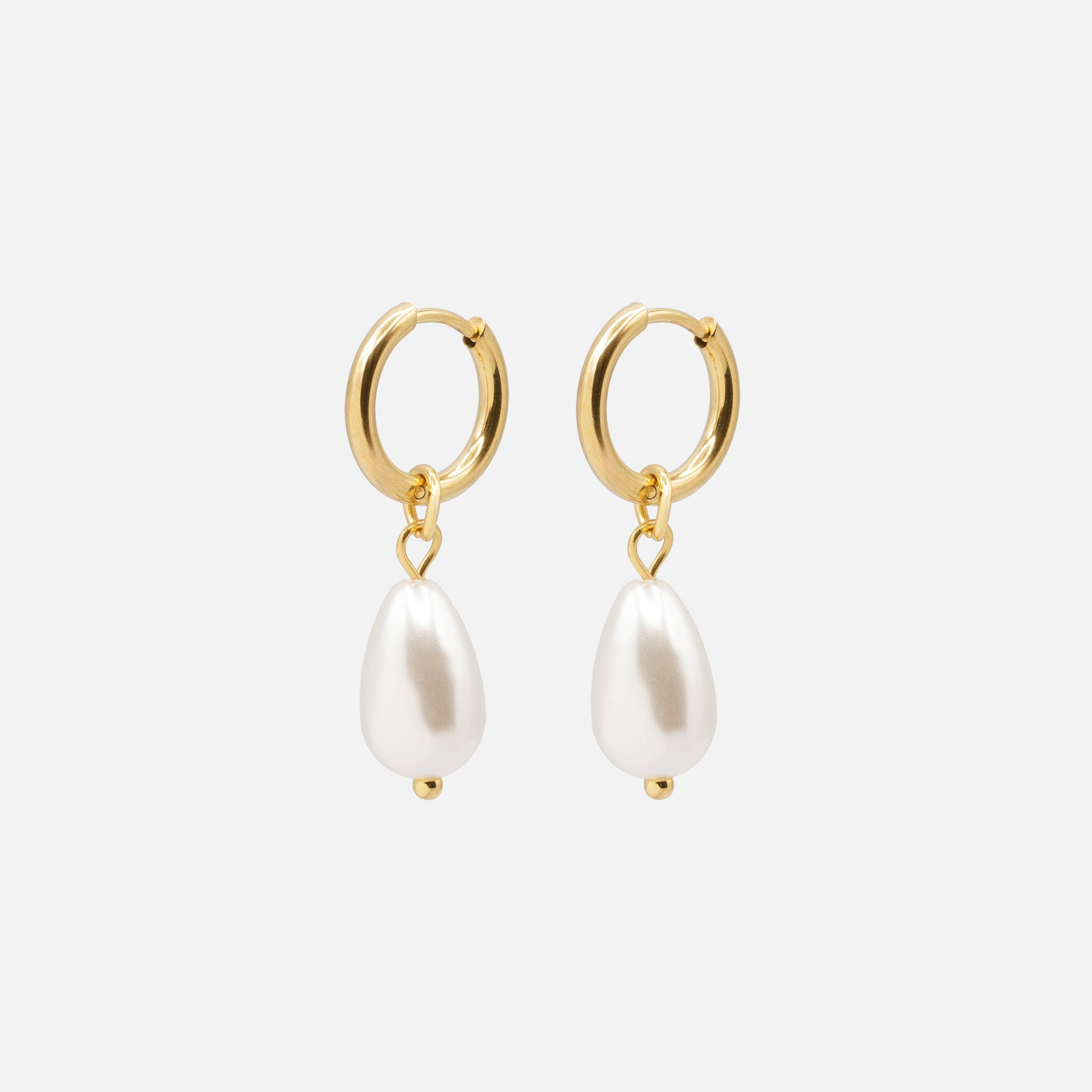 Gold huggies earrings with textured crescent moon charm in stainless steel