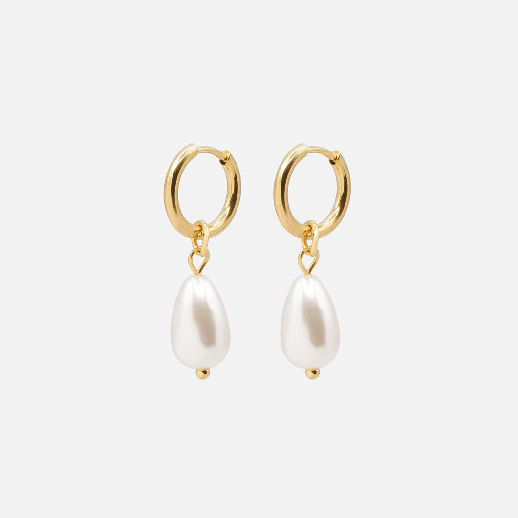 Gold huggies earrings with textured crescent moon charm in stainless steel