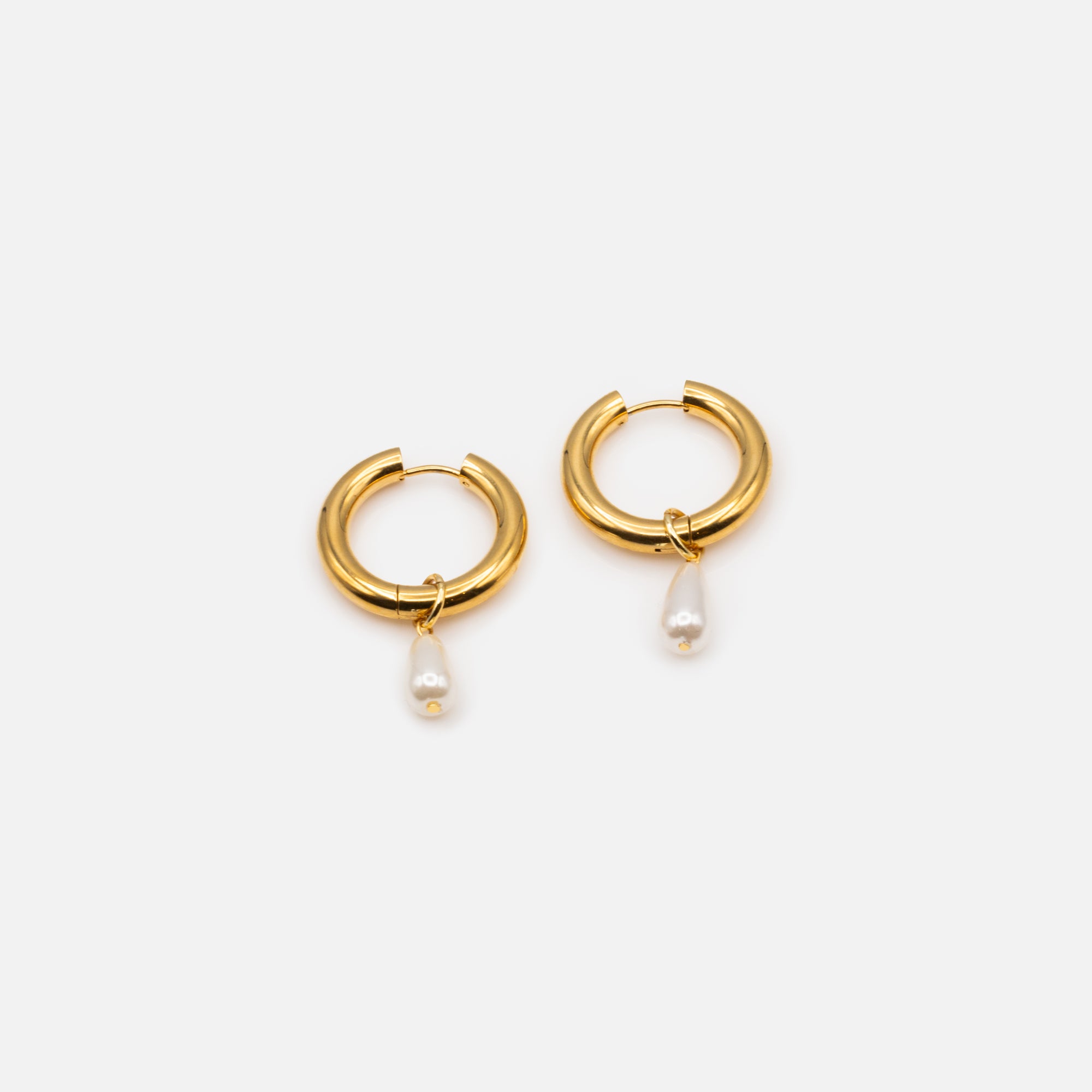 Thick golden hoop earrings 24 mm with stainless steel bead charm