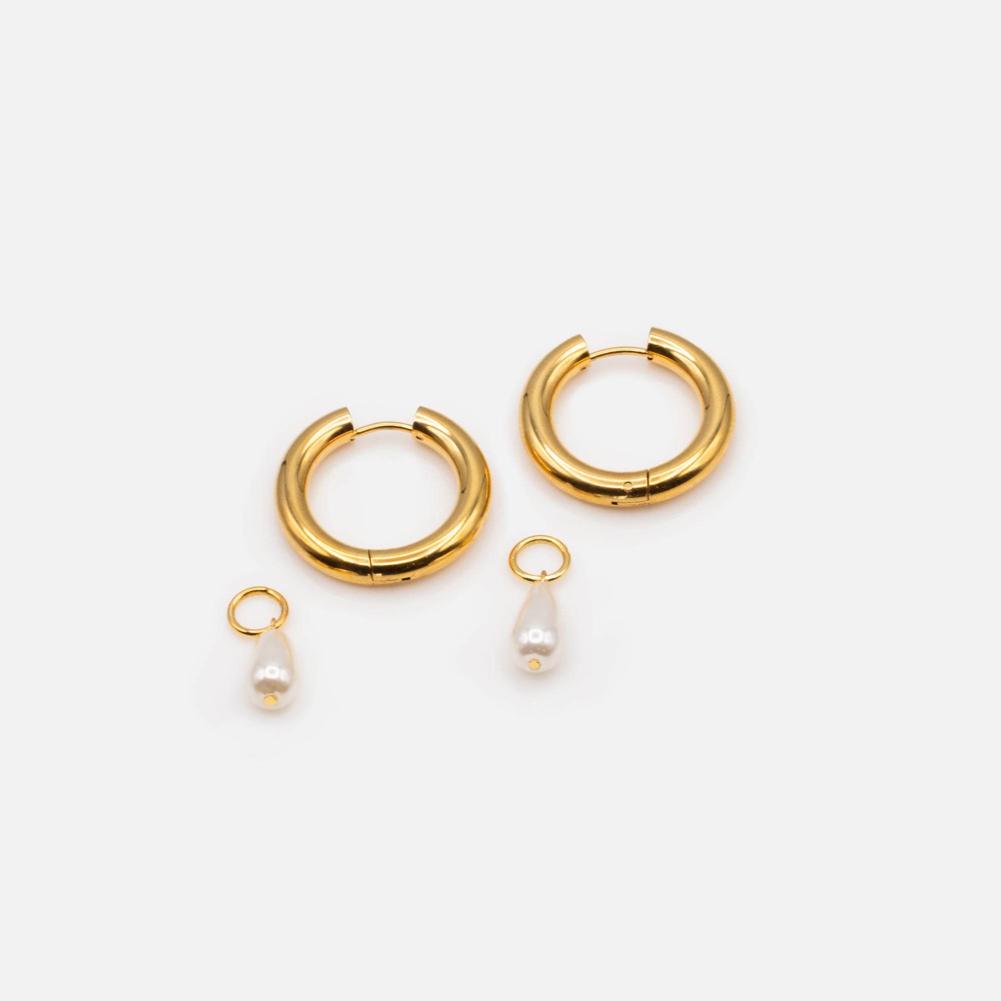 Thick golden hoop earrings 24 mm with stainless steel bead charm