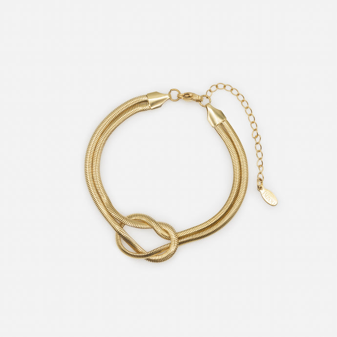 Gold knot bracelet with round serpentine links in stainless steel