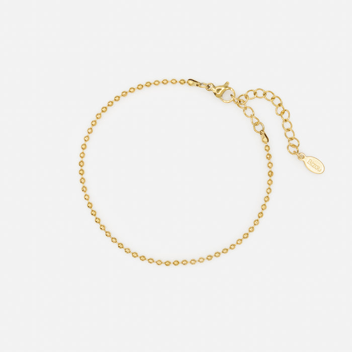 Ensemble de trois bracelets dorés avec fleur en acier inoxydable