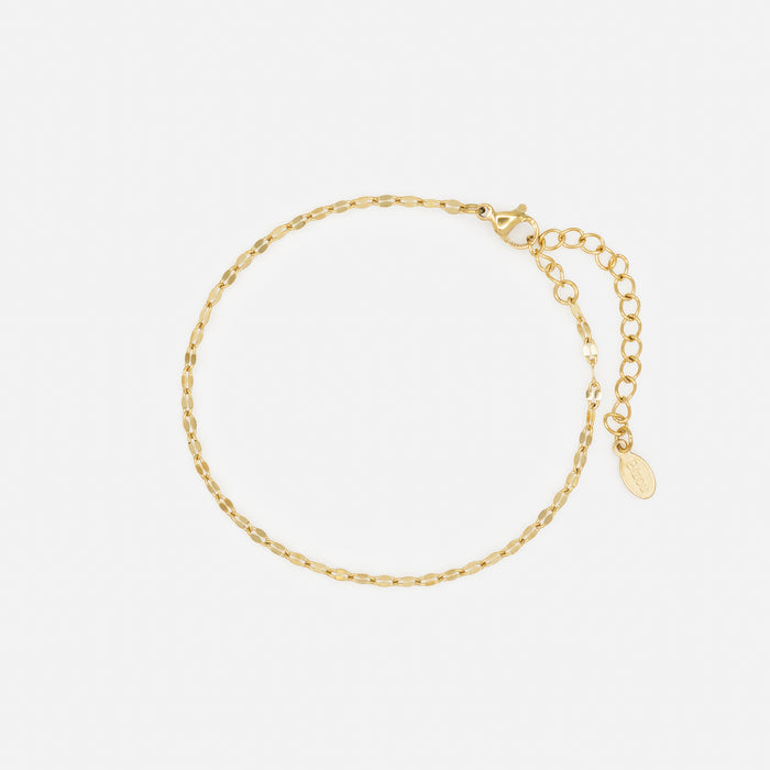 Ensemble de trois bracelets dorés avec fleur en acier inoxydable