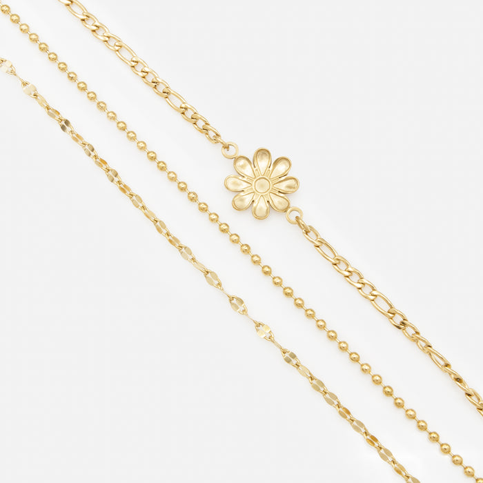 Ensemble de trois bracelets dorés avec fleur en acier inoxydable