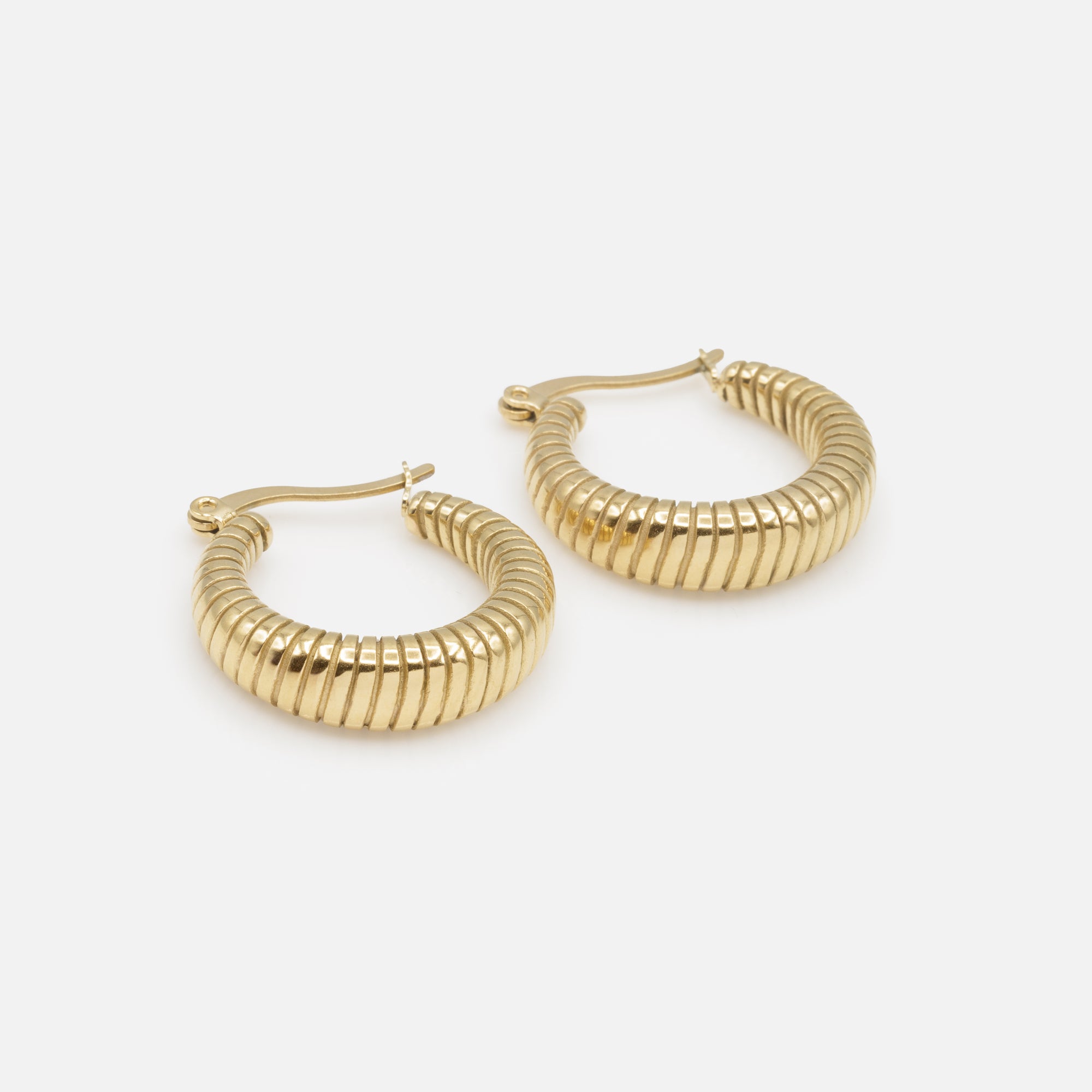 Wide gold hoop earrings with grooves in stainless steel 
