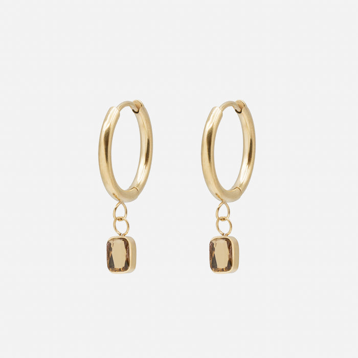 Boucles d'oreilles huggies avec pierre dorée en acier inoxydable